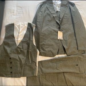 Brand New - with tags SuitSupply Suit. Mid green Havana 3 piece.